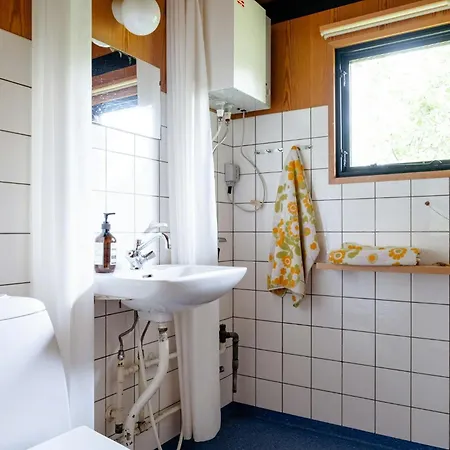 Unique House Surrounded By Willow Trees *