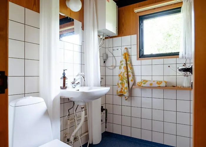 Unique House Surrounded By Willow Trees *